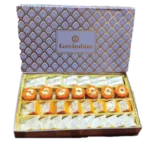 Mix Box 1kg - Kaju Katli, Pinni, Moong Barfi & Pista Roll