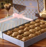 Govindam’s Balwan Laddus in a gift box with a health and wellness design