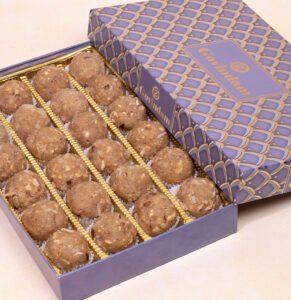 Close-up of Gond Laddu with rich texture and glossy finish