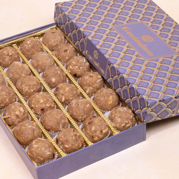 Close-up of Gond Laddu with rich texture and glossy finish