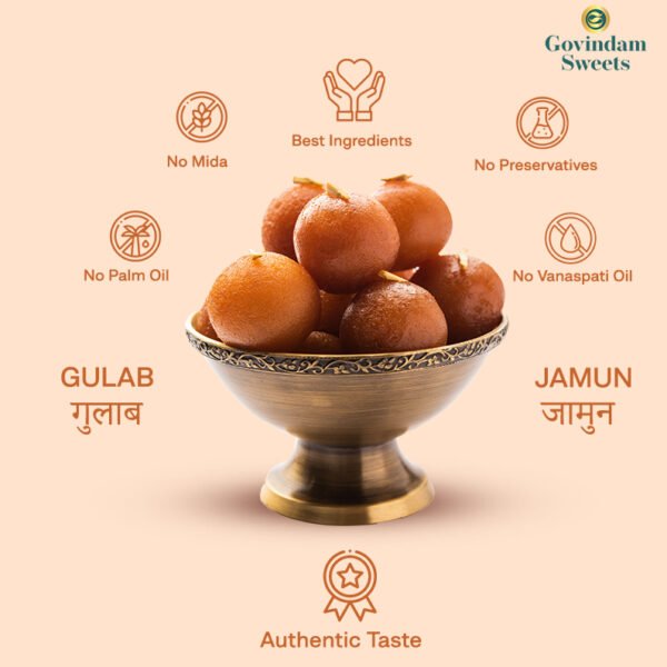 Gulab Jamuns served in an earthen bowl with silver varak and saffron