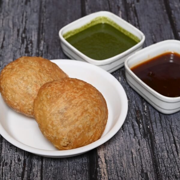 Golden and crispy Dal Kachori filled with spiced lentils.