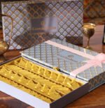 Kesar Katli gift box with festive design and logo