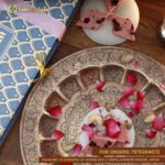 Fresh Rose Katli in assorted floral-themed mithai box with rose laddu and pista paan