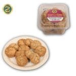 Golden millet cookies with fresh coconut flakes showing